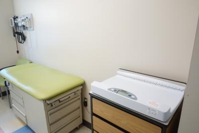 medical exam room with infant scale