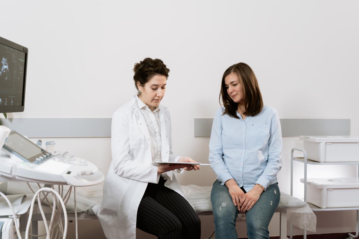 Woman consulting with doctor