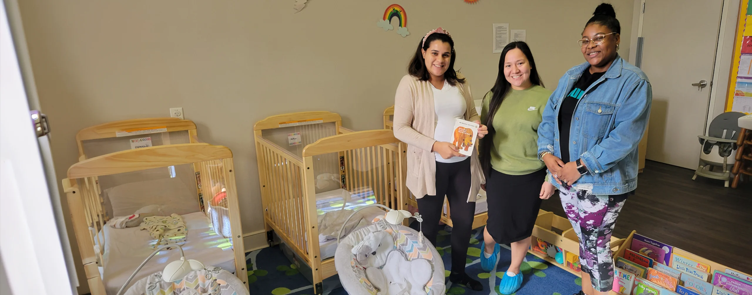 women in nursery